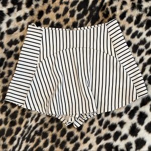 LF mini skort with black and white stripes, stretchy comfortable material